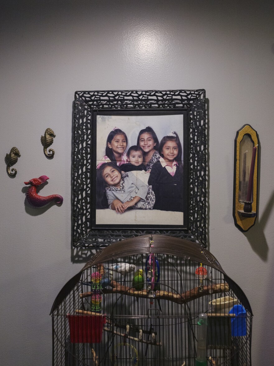 A photo of Sarah with her four sisters hangs inside their Santa Fe, Texas, home. Sarah's sisters have been a constant source of love, laughter and support since the shooting.