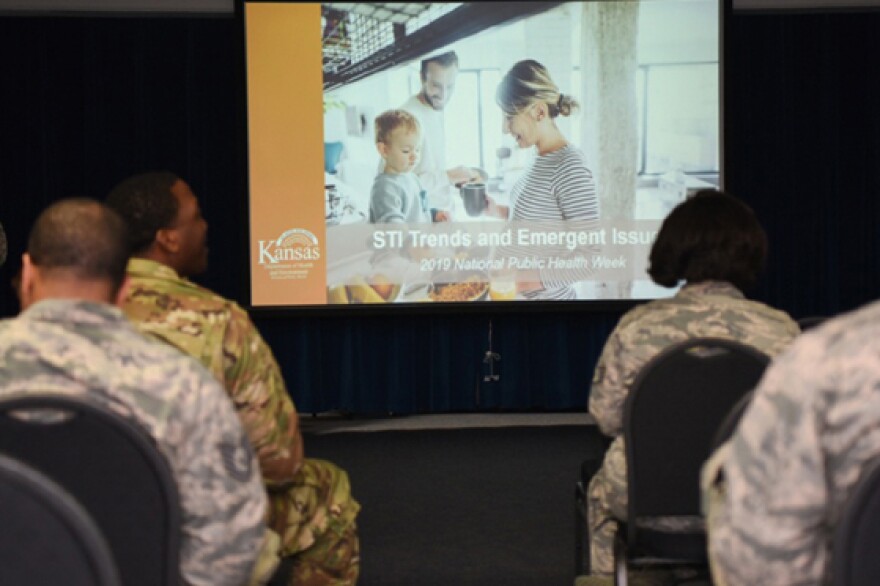 Service members attend a briefing on STIs at McConnell Air Force Base, Kansas.