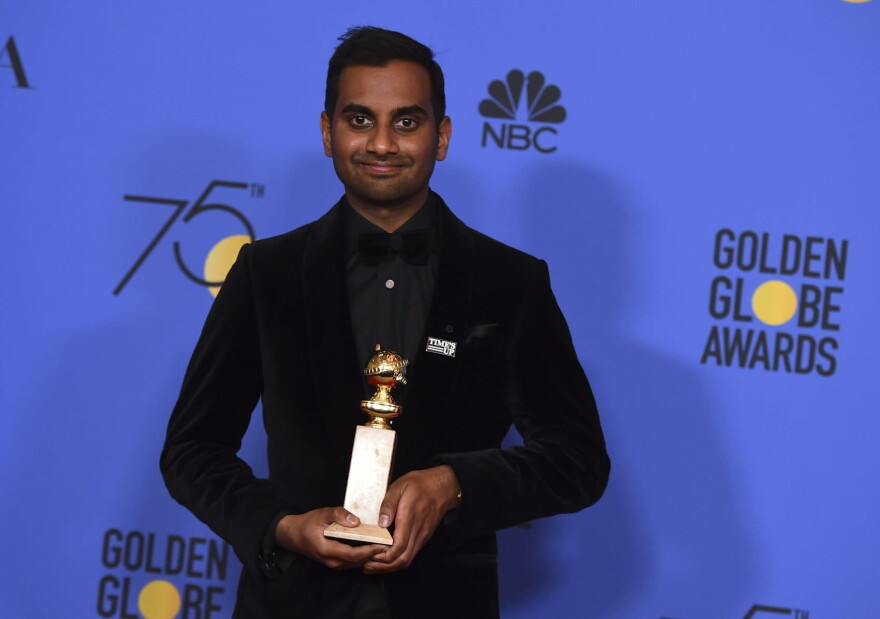 Aziz Ansari poses in the press room with the award for best performance by an actor in a television series - musical or comedy for "Master of None" at the 75th annual Golden Globe Awards. (Jordan Strauss/Invision/AP)