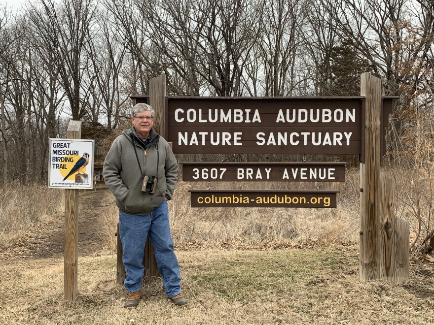 Bill Mees, Chair of the Natural Areas Committee for Columbia Audubon Society, poses for a photo in front of the CANS destination sign in Columbia, MO on Feb. 26.