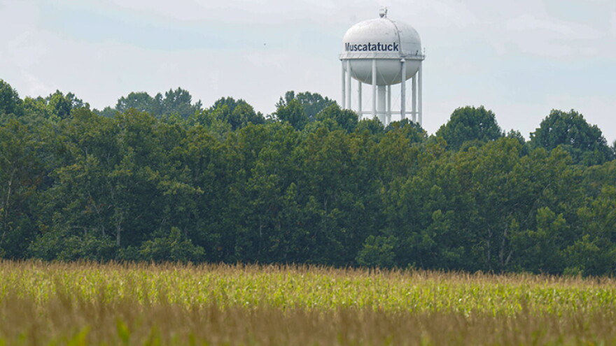 The water tower at the Muscatatuck Urban Training Center, surrounded by corn fields, is shown in Butlerville, Ind., Monday, Aug. 29, 2022. Three members of the Dutch Commando Corps, who were training at the center, were shot outside their hotel in downtown Indianapolis early Saturday morning. The Dutch Defense Ministry says that one has died.