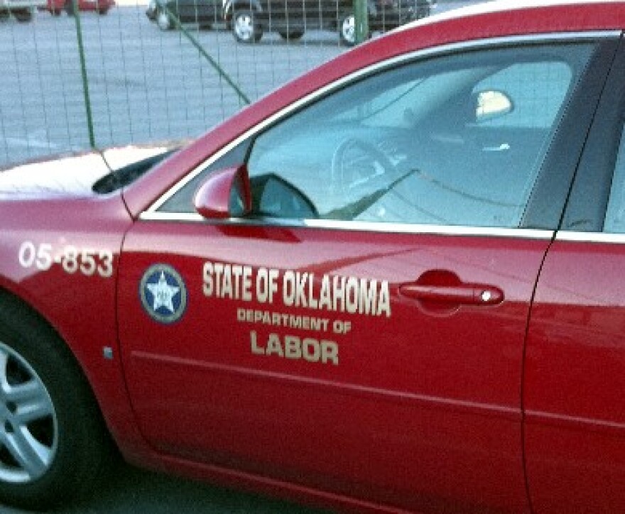 Department of Labor vehicle on fairgrounds.