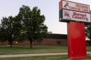 The sign outside of Freeburg Elementary School in Freeburg, Ill., is pictured on an August evening.