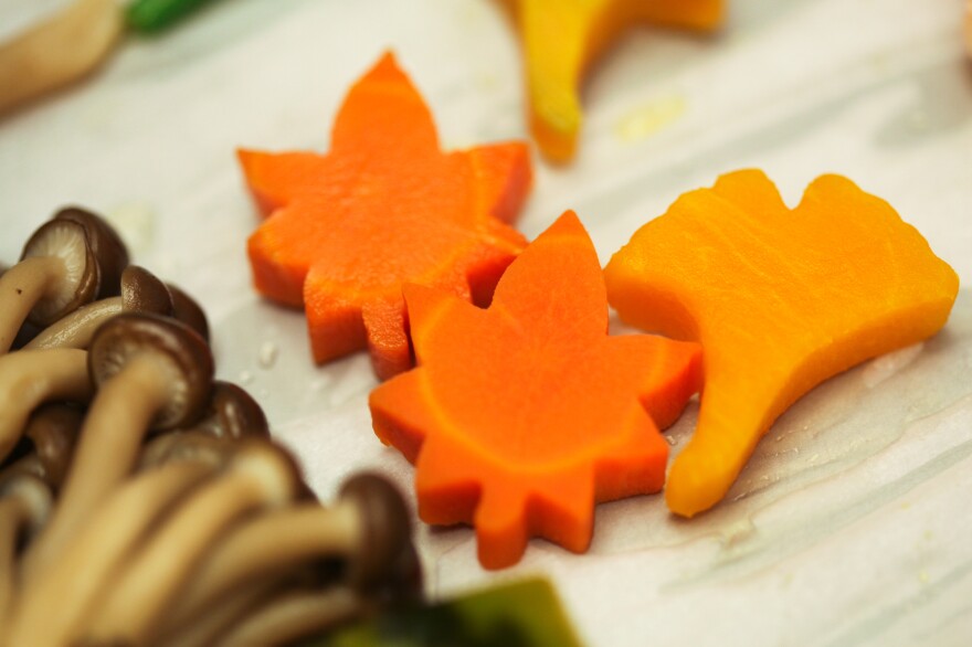 Carrots and pumpkin in the shape of leaves.