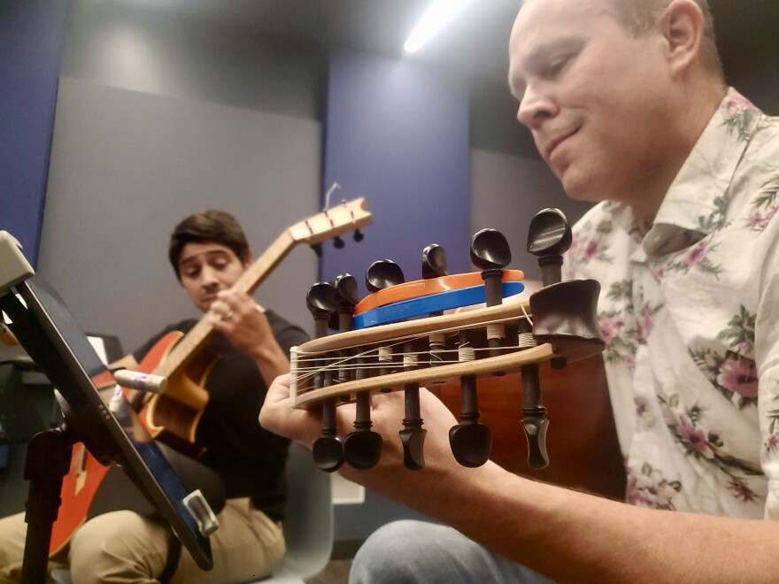 Berk Agar (guitar) and Ethan Wickman (oud) perform live on KPAC 88.3 FM.