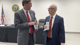 Alan Hirsch, right, the new chair of the North Carolina State Board of Elections, speaks with board member Stacy "Four" Eggers after a board meeting on Wednesday, May 10, 2023, in Raleigh, N.C. Hirsch is one of three new board members appointed by Democratic Gov. Roy Cooper to the board, which oversees elections statewide (AP Photo/Gary D. Robertson)