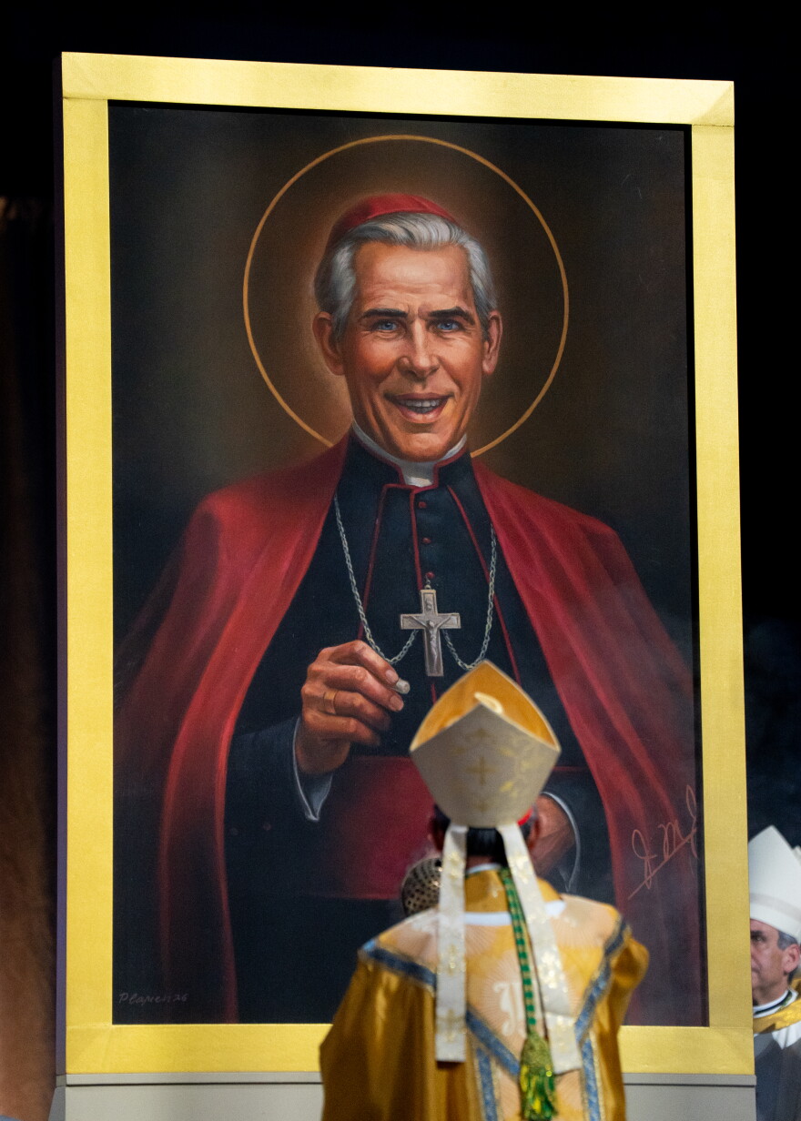 Cardinal Luis Antonio Tagle incenses a portrait of the late Archbishop Fulton J. Sheen after declaring him "Blessed" during Sheen's beatification Mass on Thursday.