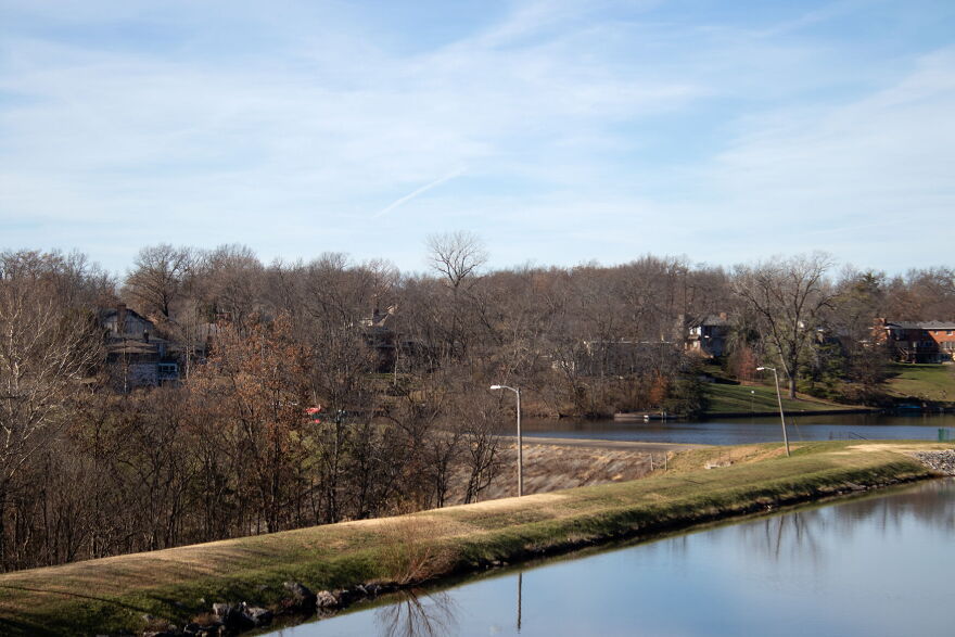 Trees rise above the Hulen Lake dams on the southwest side of Columbia. At 50 feet, the Hulen Lake dams are the tallest in the city. Unlike most private dams in the county, they are inspected every two years.