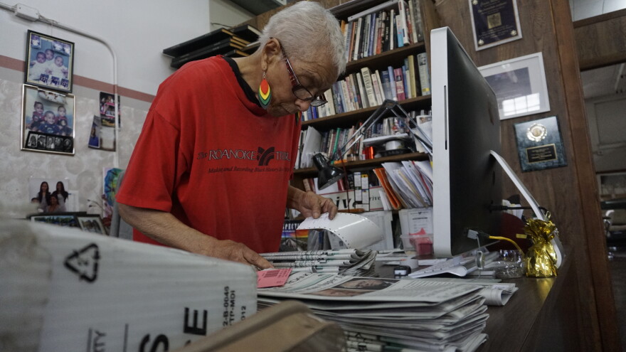 In 2020, Roanoke Tribune publisher Claudia Whitworth prepares copies of the paper for mailing.