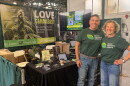 Herb Barbot, left, and Linda Baldwin stand at the Green Standard Alliance booth at the New York State Fair.