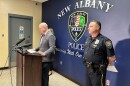 Southern Indiana officials announced four people have been arrested in connection with a shooting last month at Harvest Homecoming in New Albany. At podium: Floyd County Prosecutor Chris Lane addresses news media. (to the right is New Albany Police Chief Todd Bailey.)