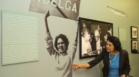 Dolores Huerta, co-founder of United Farms Workers looked at an iconic photograph of herself, as she toured her exhibition, "Viva la Causa! Dolores Huerta and the Struggle for Justice," at La Plaza de la Cultura y Artes museum downtown Los Angeles on Thursday, April 10, 2014.