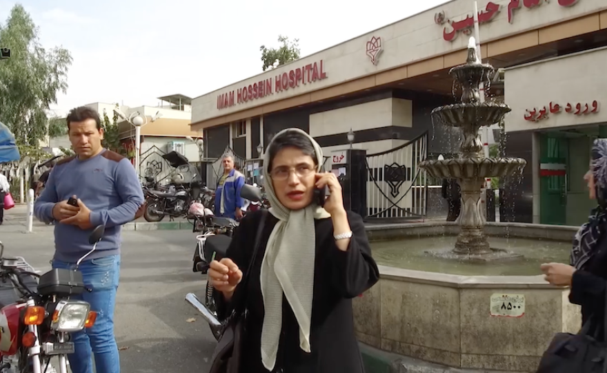 In a scene from the documentary <em>Nasrin, </em>Sotoudeh is shown outside a Tehran hospital before her arrest in 2018.