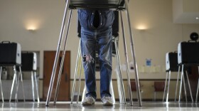 A voter fills out their Ohio primary election ballot at a polling location in Knox Presbyterian Church in Cincinnati, Ohio, on Tuesday, March 19, 2024.