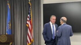 Oklahoma Treasurer Todd Russ, left, talks with Mark Wood, director of the Office of Management and Enterprise Services, before a meeting of the State Pension Commission at the Capitol in Oklahoma City on Tuesday, Sept. 1, 2026.