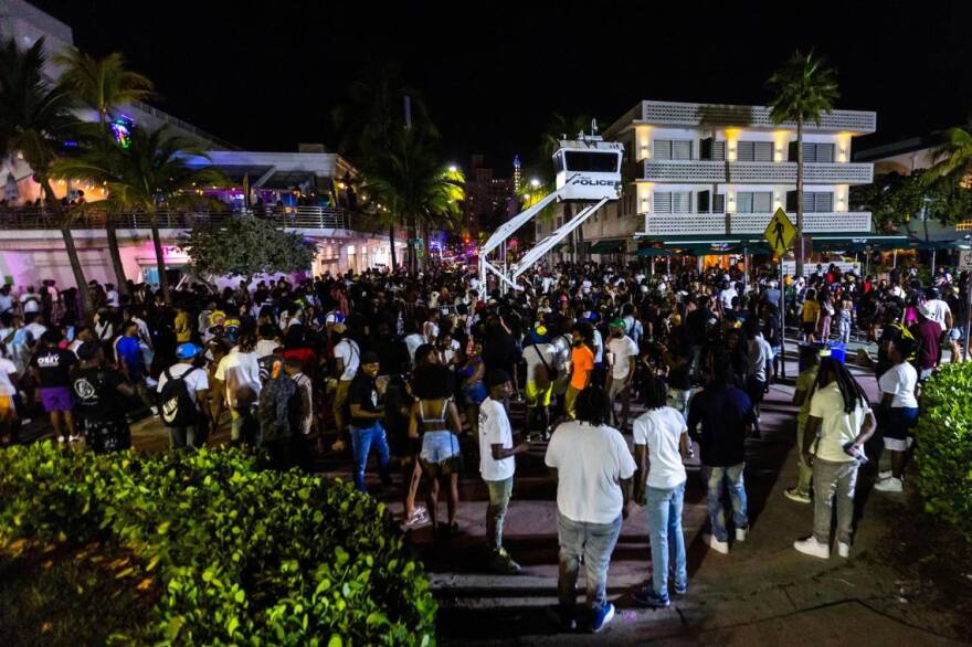 Crowds gather at Ocean Drive and Eighth during spring break in Miami Beach, Florida, on Saturday, March 18, 2023.