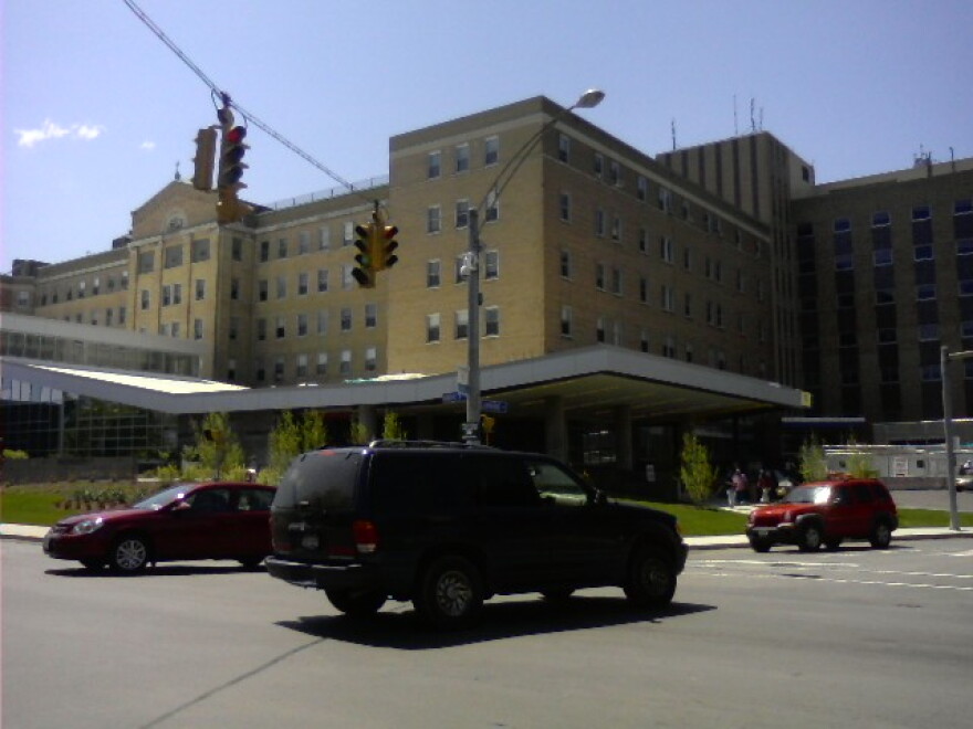 Busy corner of Abbott & Lorraine Avenue in front of Mercy Hospital