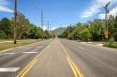 Sunnyside Avenue in Salt Lake City, seen here on July 3, 2023, is wide enough for four lanes of traffic, a middle turn lane and a dedicated bike lane. Residential houses also line the south side of the road.