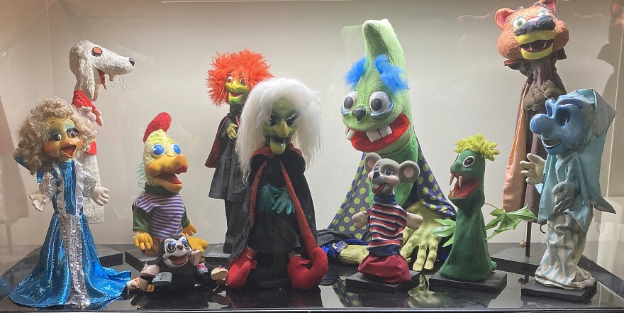 Larry Smith's Hattie the Witch, Rudy and Teaser, Snarfie R. Dog, Mean Old Cat and other puppets displayed at the VOA Museum.