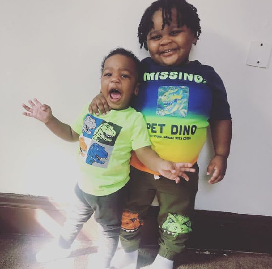 3-year-old Raphael (left) and his brother, 4-year-old Phillip (right) pose for a picture. Their mother, Raevin Martin, is advocating for lead education and abatement to prevent elevated blood lead levels in kids.