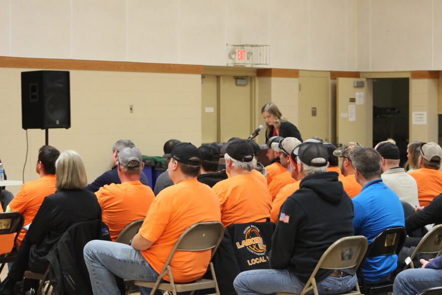 Union supporters of ALLETE's planned acquisition wear orange at a public hearing in Cohasset on April 8, 2025.