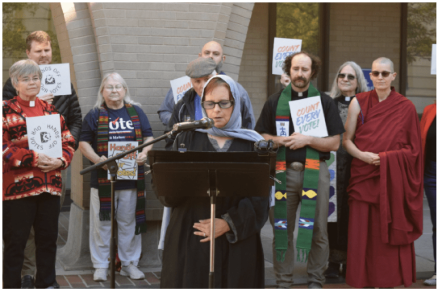 Karen Stromgren speaks at a press conference in front of the Thomas S. Foley Federal Courthouse in Spokane, Wash., Oct. 6, 2026.