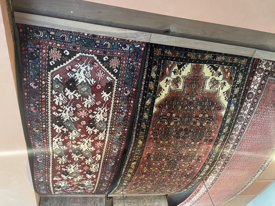 Laymoon Cafe's Persion rugs on the ceiling.
