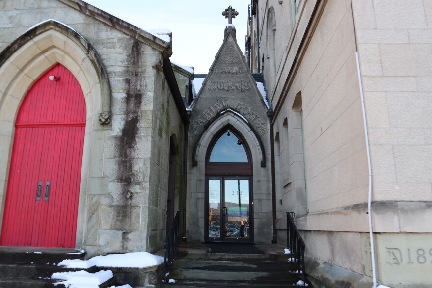 St. Luke's Episcopal Church in Scranton, Pennsylvania. Above the glass door, lettering reads "St. Luke's Parish House".