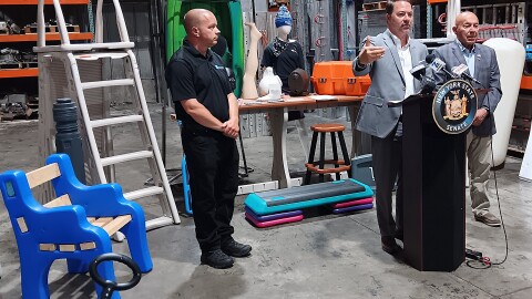 State Senator Robert Ortt speaks Wednesday, July 15, 2026 during an appearance at Confer Plastics in North Tonawanda, NY. Listening near him are, from left, Bob Confer, president of Confer Plastics, and State Assemblymember Angelo Morinello.