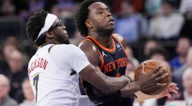 New York Knicks forward OG Anunoby, right, drives to the basket against Denver Nuggets guard Reggie Jackson (7) in the second half of an NBA basketball game, Thursday, Jan. 25, 2024, at Madison Square Garden in New York. (AP Photo/Mary Altaffer)