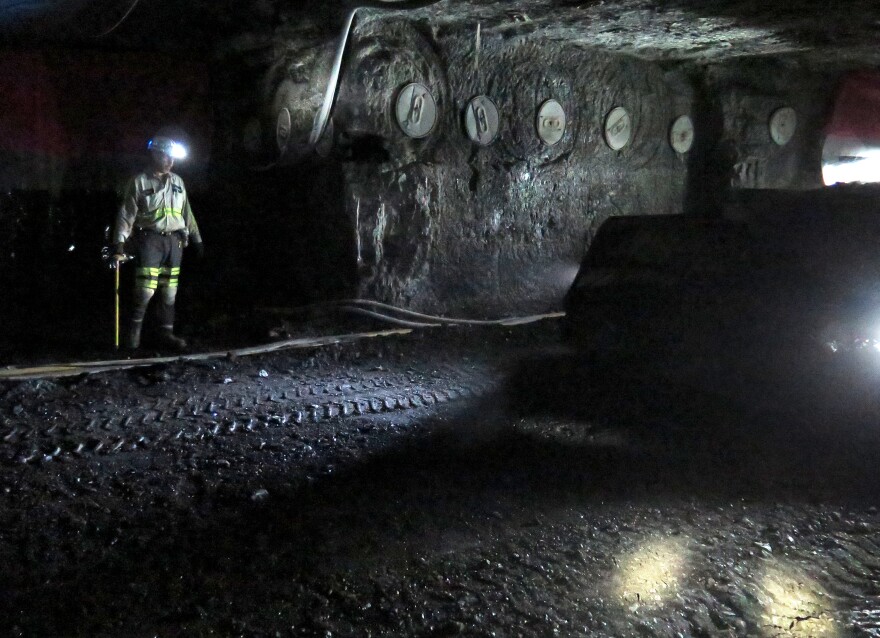 A coal miner stands in the Dotiki mine, operated by Alliance Coal, in Webster County, Ky.