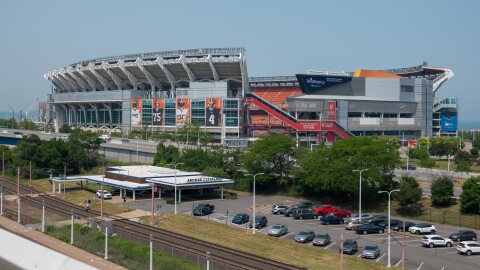 Browns Stadium in the background and the Amtrak parking lot in the foreground.