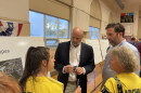 Archbald resident and cofounder of Stop Archbald Data Centers Tamara Misewicz-Healey, left, questions Erik Draaisma, executive vice president of business development for Corscale, during an open house for the Project Gravity Data Center Campus.