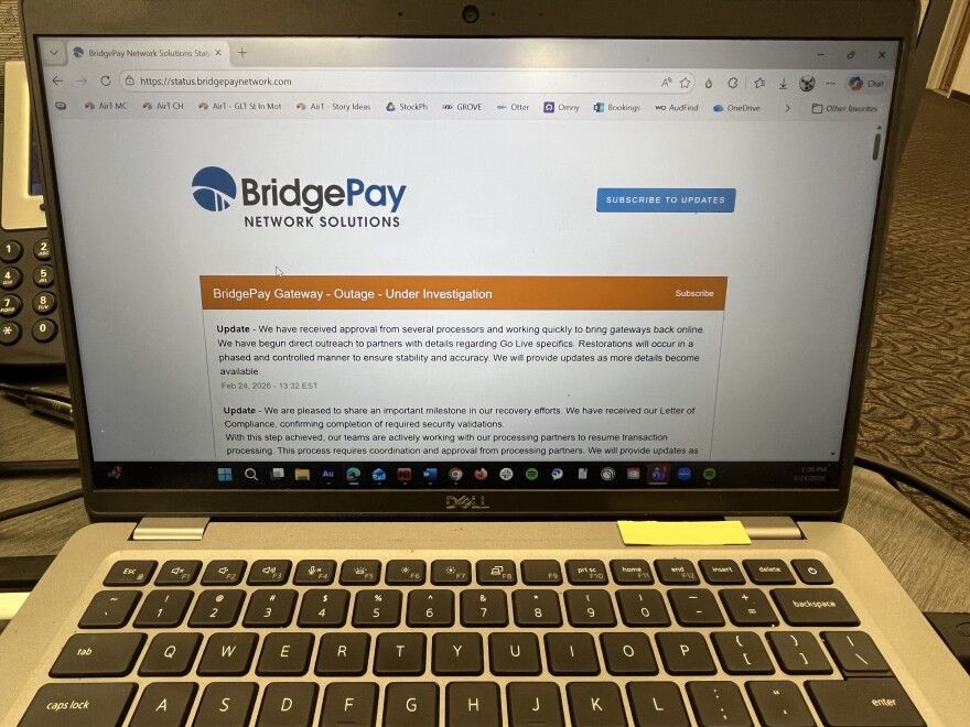 An image of a laptop computer with a web page displayed.