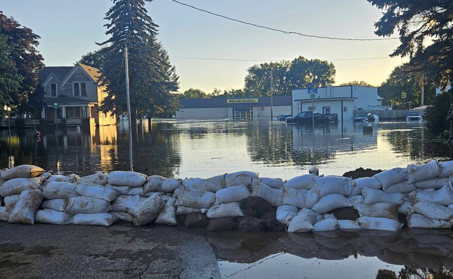 Luke Bryan performing at a farm concert in 2025 in Iowa