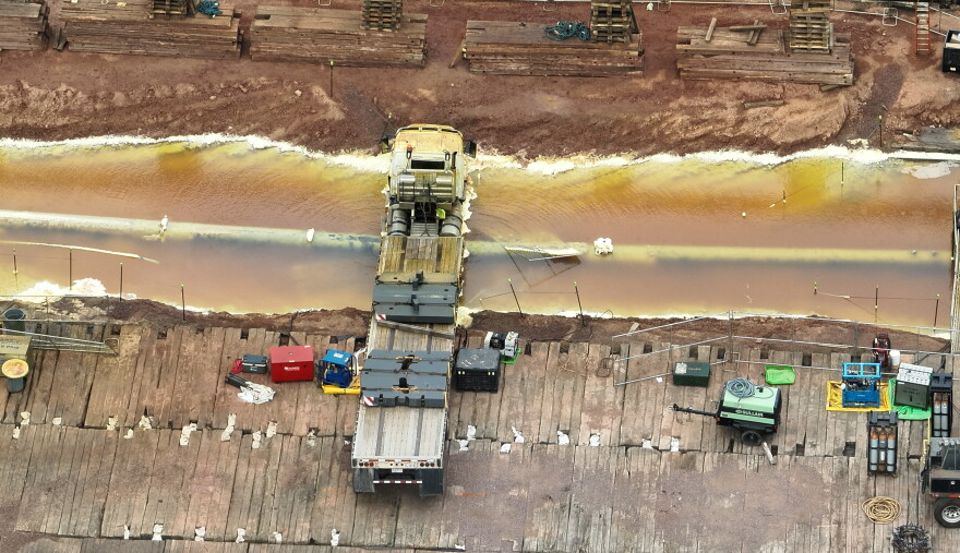Picture of a semi which rolled into an excavation site, damaging the Enbridge Line 5 pipeline
