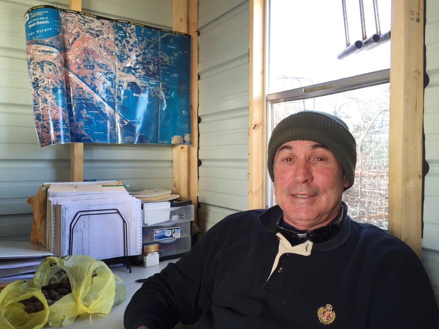 Tony Goutierrez sits inside his office (a trailer on his dock) in Hopedale, La. He says he's having a hard time meeting the demand for Gulf crabs from his longtime customers.