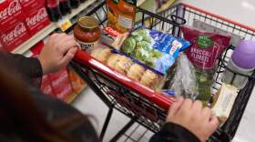 A California's SNAP benefits shopper pushes a cart through a supermarket in Bellflower, Calif., Feb. 13, 2023. (Allison Dinner/AP)