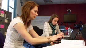 CU Journalism students Kate Spencer (left) and Isa Jones (right) work at the school's online news site, the CU Independent.