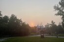 A hazy sky during a summer sunset at the Historic Clifton Mill  
