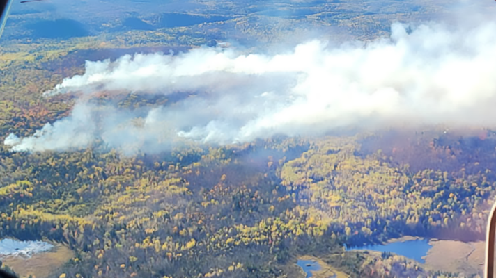 The Crosby Fire burns Oct. 8, 2025, in George H. Crosby Manitou State Park in Lake County.