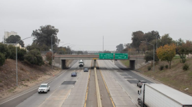 Image of Hwy 99 and its signage from inside a vehicle.