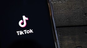The TikTok app is displayed on an Apple iPhone. (Drew Angerer/Getty Images)