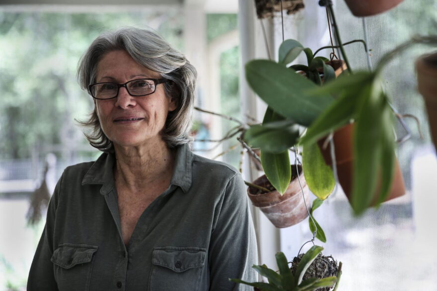 Joyce DiBenedetto-Colton, a retired Miami Dade College educator, at her home in High Springs. DiBenedetto-Colton says she and her husband migrated from Miami to North Central Florida “in great part due to present and impending climate change.” Photo credit: Andrea Cornejo.