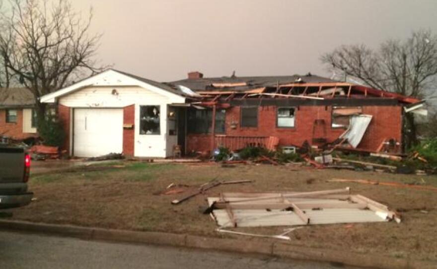 A damaged home on Rock Place between NW 5th and Janeway Ave. in Moore damaged by Wednesday evening's tornado.