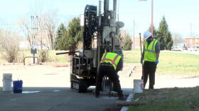 Workers at Creek Run Environmental take a soil sample at a gas station site being cleaned up in Columbus. Creek Run is not involved in the current lawsuit.
