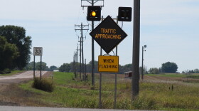 An example of an Intersection Conflict Warning sign. Ones being installed in Indiana may look a little different.