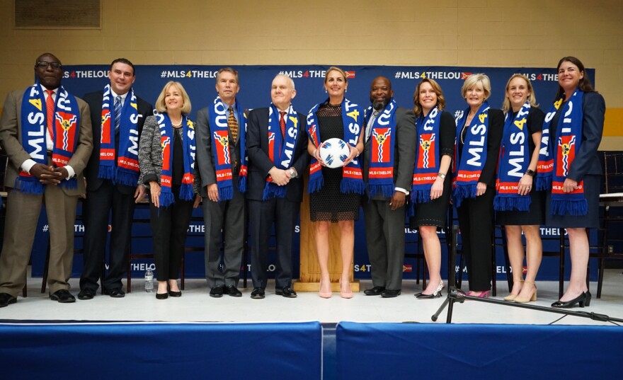 The St. Louis Board of Aldermen has backed the efforts of an ownership group, pictured here with civic leaders on Oct. 9, 2018, to bring a Major League Soccer team to St. Louis.