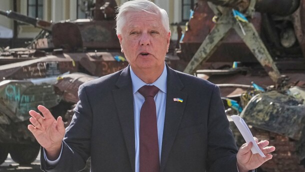 U.S. Sen. Lindsey Graham, R-S.C. answers a question from a media member near damaged Russian vehicles on display in central Kyiv, Ukraine, Friday, July 10, 2026. (AP Photo/Efrem Lukatsky)