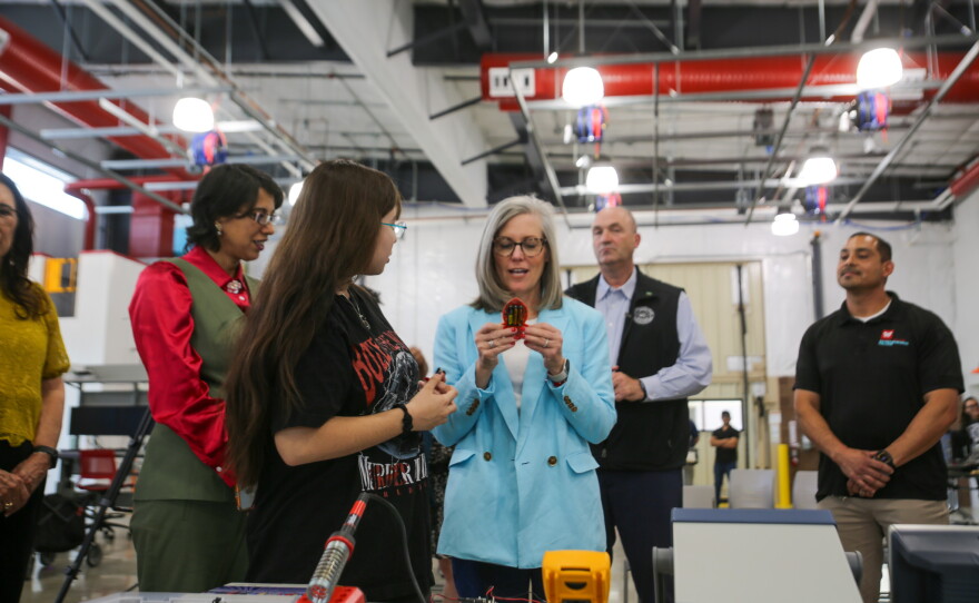A student demonstrates some of the material she and her peers have been learning at the AWC Future48 Workforce Accelerator with Arizona Gov. Katie Hobbs. The accelerator is one of seven in the state.